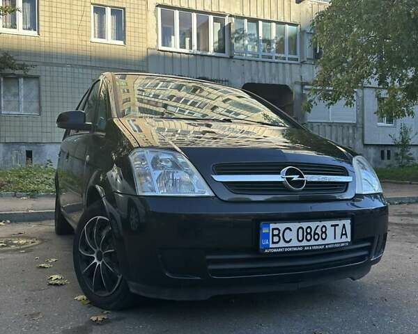 Черный Опель Мерива, объемом двигателя 1.6 л и пробегом 228 тыс. км за 4500 $, фото 1 на Automoto.ua