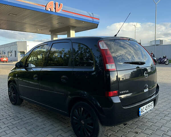 Черный Опель Мерива, объемом двигателя 1.6 л и пробегом 225 тыс. км за 4600 $, фото 4 на Automoto.ua