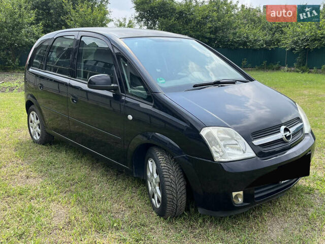 Черный Опель Мерива, объемом двигателя 1.4 л и пробегом 153 тыс. км за 4433 $, фото 1 на Automoto.ua