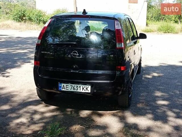 Черный Опель Мерива, объемом двигателя 1.6 л и пробегом 207 тыс. км за 4470 $, фото 2 на Automoto.ua