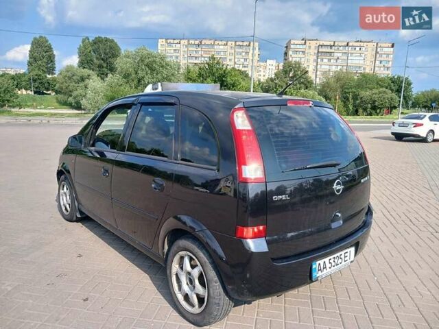 Черный Опель Мерива, объемом двигателя 1.6 л и пробегом 230 тыс. км за 4100 $, фото 2 на Automoto.ua