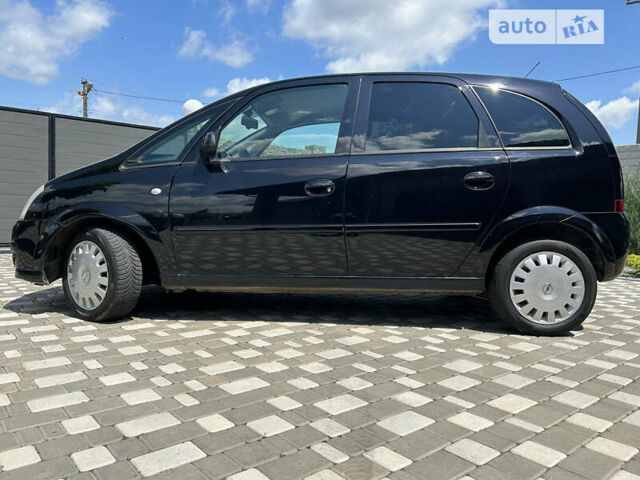 Опель Меріва 2006 у Полтаві на Automoto.ua Чорний Опель Меріва, об'ємом двигуна 1.6 л та пробігом 201 тис. км за 4999 $, фото 7 на Automoto.ua