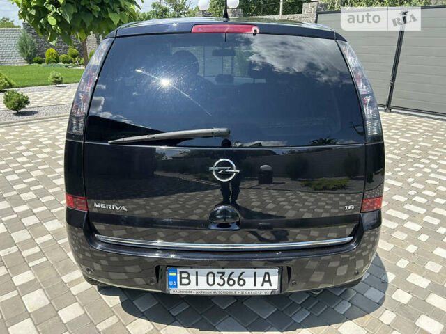 Опель Меріва 2006 у Полтаві на Automoto.ua Чорний Опель Меріва, об'ємом двигуна 1.6 л та пробігом 201 тис. км за 4999 $, фото 13 на Automoto.ua