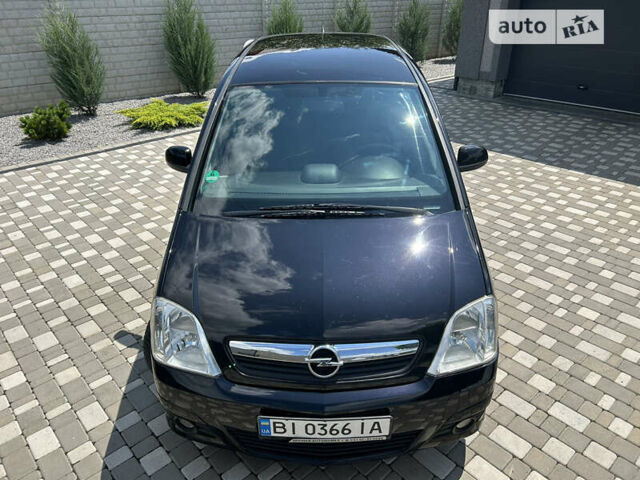 Опель Меріва 2006 у Полтаві на Automoto.ua Чорний Опель Меріва, об'ємом двигуна 1.6 л та пробігом 201 тис. км за 4999 $, фото 17 на Automoto.ua
