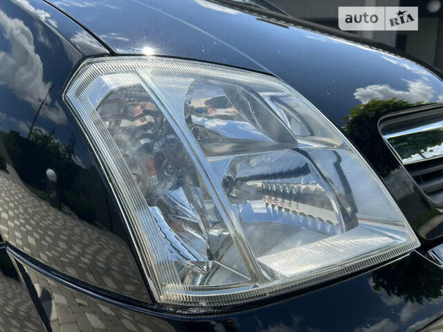 Опель Меріва 2006 у Полтаві на Automoto.ua Чорний Опель Меріва, об'ємом двигуна 1.6 л та пробігом 201 тис. км за 4999 $, фото 37 на Automoto.ua