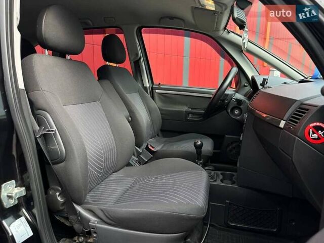 Опель Мерива 2006 в Киеве на Automoto.ua Черный Опель Мерива, объемом двигателя 1.6 л и пробегом 262 тыс. км за 5290 $, фото 11 на Automoto.ua