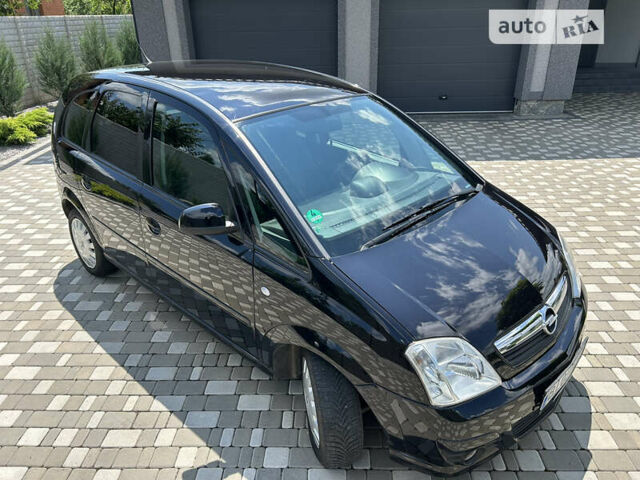 Опель Меріва 2006 у Полтаві на Automoto.ua Чорний Опель Меріва, об'ємом двигуна 1.6 л та пробігом 201 тис. км за 4999 $, фото 18 на Automoto.ua