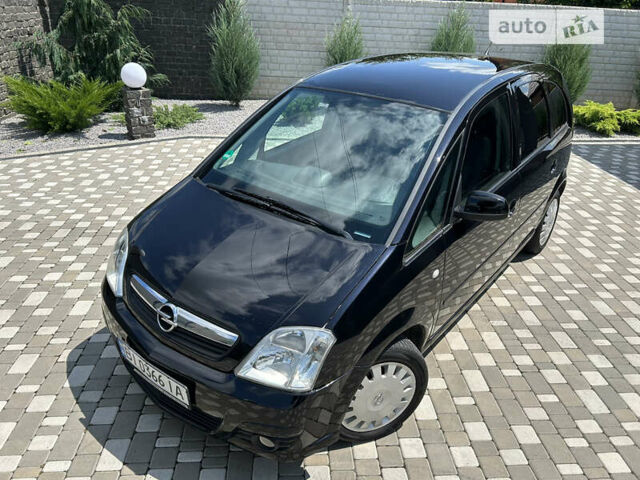 Опель Меріва 2006 у Полтаві на Automoto.ua Чорний Опель Меріва, об'ємом двигуна 1.6 л та пробігом 201 тис. км за 4999 $, фото 16 на Automoto.ua