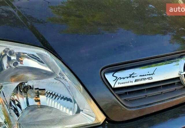 Черный Опель Мерива, объемом двигателя 1.6 л и пробегом 186 тыс. км за 4000 $, фото 5 на Automoto.ua