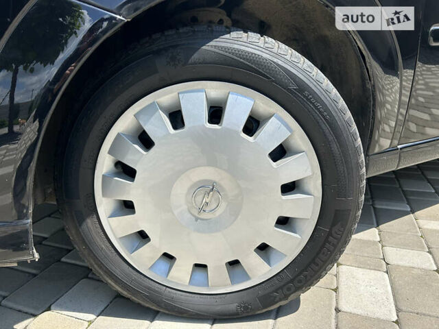 Опель Меріва 2006 у Полтаві на Automoto.ua Чорний Опель Меріва, об'ємом двигуна 1.6 л та пробігом 201 тис. км за 4999 $, фото 29 на Automoto.ua
