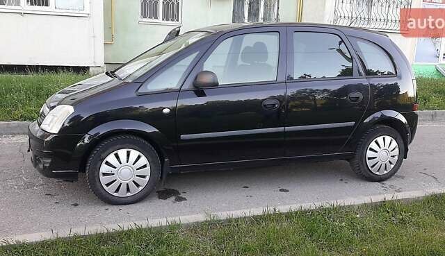 Черный Опель Мерива, объемом двигателя 1.6 л и пробегом 194 тыс. км за 4500 $, фото 8 на Automoto.ua