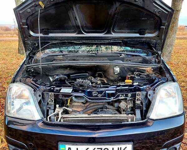 Черный Опель Мерива, объемом двигателя 1.6 л и пробегом 280 тыс. км за 4300 $, фото 38 на Automoto.ua