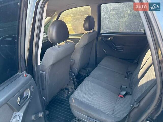 Черный Опель Мерива, объемом двигателя 1.6 л и пробегом 206 тыс. км за 4400 $, фото 4 на Automoto.ua
