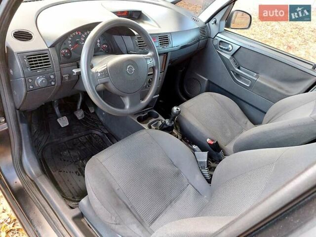 Черный Опель Мерива, объемом двигателя 1.6 л и пробегом 280 тыс. км за 4300 $, фото 27 на Automoto.ua