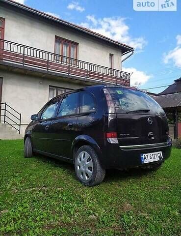 Черный Опель Мерива, объемом двигателя 1.3 л и пробегом 134 тыс. км за 4500 $, фото 2 на Automoto.ua