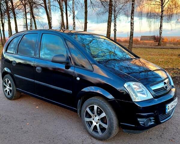 Черный Опель Мерива, объемом двигателя 1.6 л и пробегом 280 тыс. км за 4300 $, фото 5 на Automoto.ua