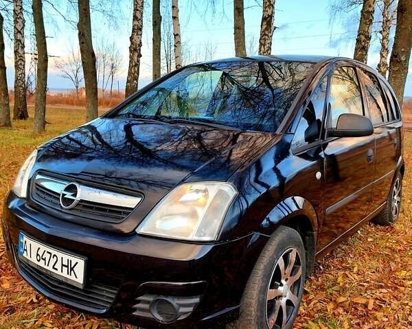 Черный Опель Мерива, объемом двигателя 1.6 л и пробегом 280 тыс. км за 4300 $, фото 2 на Automoto.ua