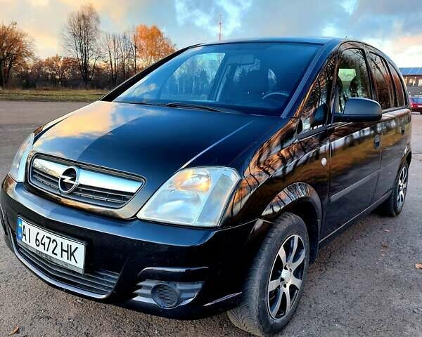 Черный Опель Мерива, объемом двигателя 1.6 л и пробегом 280 тыс. км за 4300 $, фото 10 на Automoto.ua