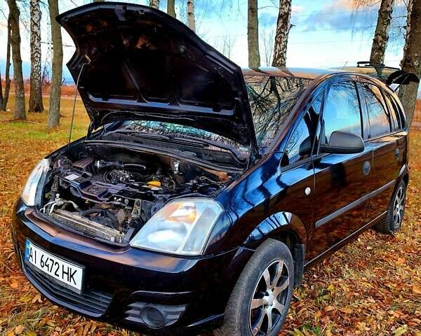 Черный Опель Мерива, объемом двигателя 1.6 л и пробегом 280 тыс. км за 4300 $, фото 41 на Automoto.ua