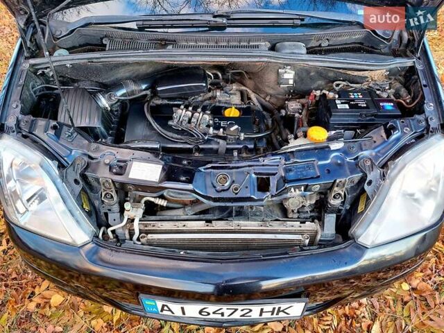 Черный Опель Мерива, объемом двигателя 1.6 л и пробегом 280 тыс. км за 4300 $, фото 39 на Automoto.ua