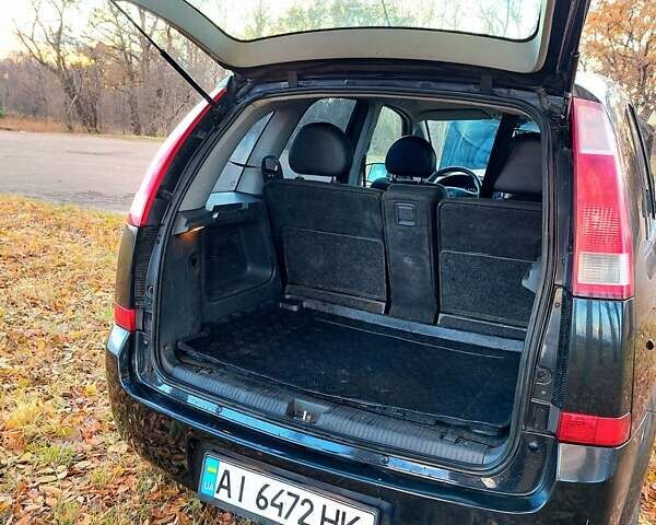 Черный Опель Мерива, объемом двигателя 1.6 л и пробегом 280 тыс. км за 4300 $, фото 43 на Automoto.ua
