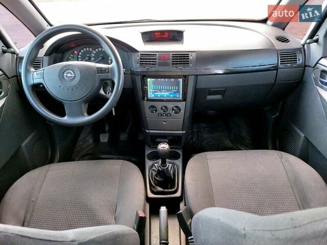 Черный Опель Мерива, объемом двигателя 1.6 л и пробегом 280 тыс. км за 4300 $, фото 34 на Automoto.ua