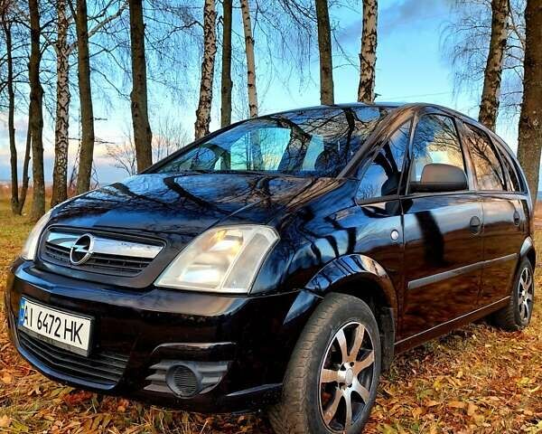 Черный Опель Мерива, объемом двигателя 1.6 л и пробегом 280 тыс. км за 4300 $, фото 12 на Automoto.ua