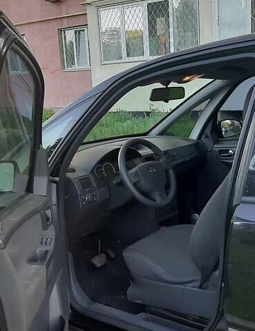 Черный Опель Мерива, объемом двигателя 1.6 л и пробегом 194 тыс. км за 4500 $, фото 6 на Automoto.ua