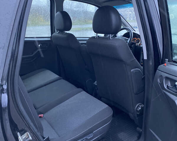 Черный Опель Мерива, объемом двигателя 1.7 л и пробегом 272 тыс. км за 4700 $, фото 32 на Automoto.ua