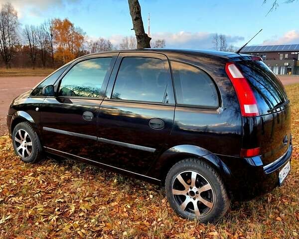 Черный Опель Мерива, объемом двигателя 1.6 л и пробегом 280 тыс. км за 4300 $, фото 13 на Automoto.ua