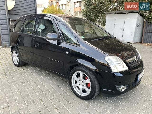 Черный Опель Мерива, объемом двигателя 1.8 л и пробегом 260 тыс. км за 5800 $, фото 8 на Automoto.ua