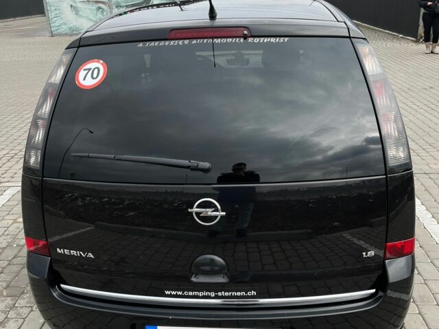 Черный Опель Мерива, объемом двигателя 1.8 л и пробегом 137 тыс. км за 4650 $, фото 3 на Automoto.ua