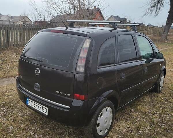 Черный Опель Мерива, объемом двигателя 0 л и пробегом 186 тыс. км за 3800 $, фото 3 на Automoto.ua
