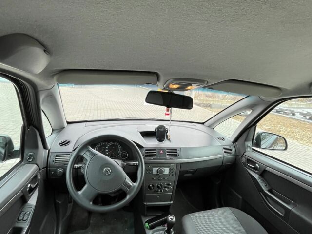 Черный Опель Мерива, объемом двигателя 1.8 л и пробегом 137 тыс. км за 4650 $, фото 5 на Automoto.ua