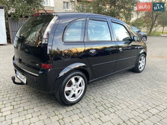 Черный Опель Мерива, объемом двигателя 1.8 л и пробегом 260 тыс. км за 5800 $, фото 14 на Automoto.ua