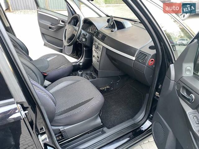 Черный Опель Мерива, объемом двигателя 1.8 л и пробегом 260 тыс. км за 5800 $, фото 18 на Automoto.ua