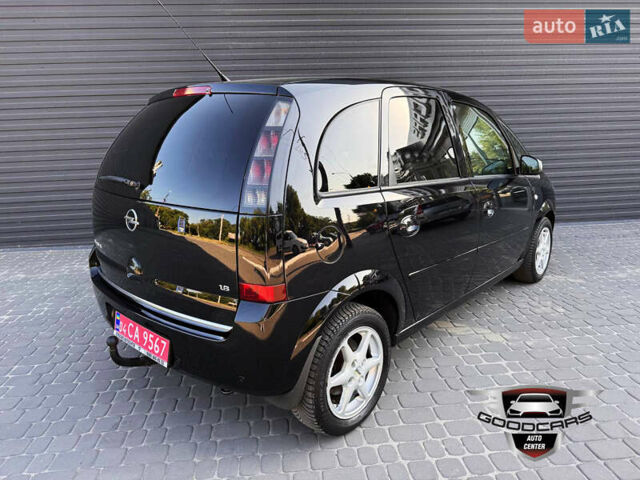 Черный Опель Мерива, объемом двигателя 1.6 л и пробегом 205 тыс. км за 6500 $, фото 1 на Automoto.ua