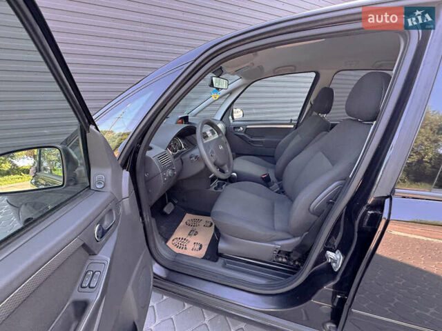 Черный Опель Мерива, объемом двигателя 1.6 л и пробегом 205 тыс. км за 6500 $, фото 4 на Automoto.ua