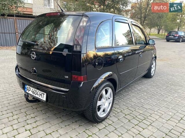 Черный Опель Мерива, объемом двигателя 1.8 л и пробегом 260 тыс. км за 5800 $, фото 15 на Automoto.ua