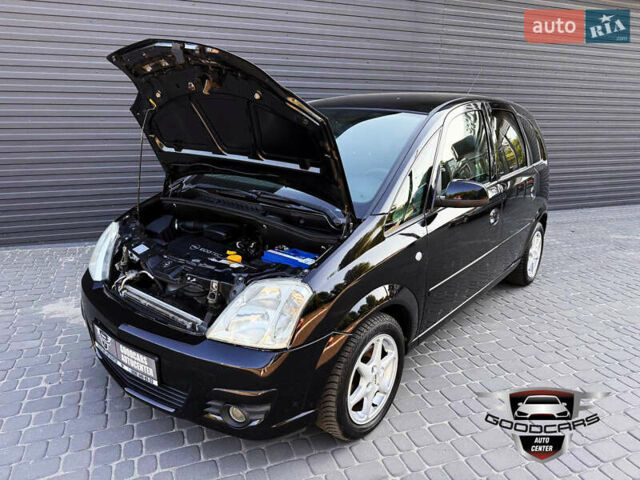 Черный Опель Мерива, объемом двигателя 1.6 л и пробегом 205 тыс. км за 6500 $, фото 5 на Automoto.ua