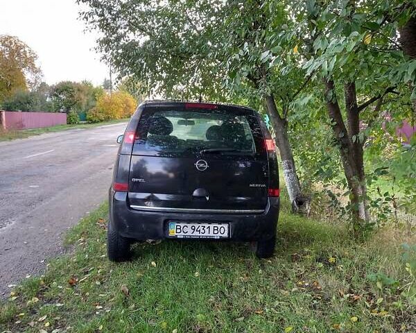 Черный Опель Мерива, объемом двигателя 1.6 л и пробегом 145 тыс. км за 2499 $, фото 4 на Automoto.ua