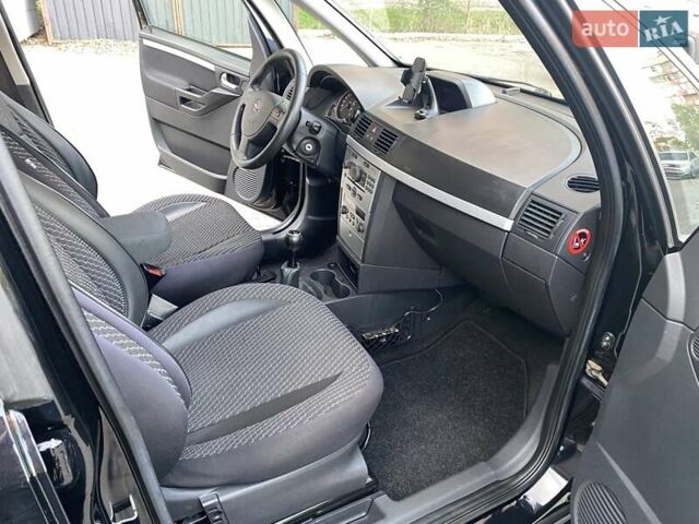 Черный Опель Мерива, объемом двигателя 1.8 л и пробегом 260 тыс. км за 5800 $, фото 17 на Automoto.ua