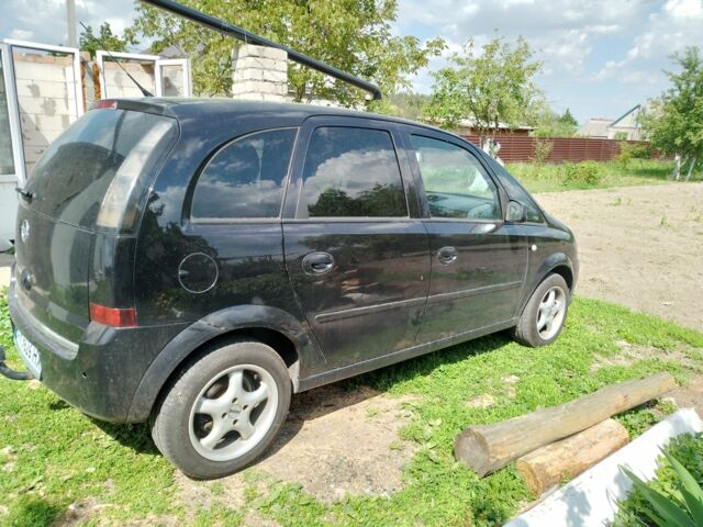 Черный Опель Мерива, объемом двигателя 1.4 л и пробегом 160 тыс. км за 3700 $, фото 3 на Automoto.ua