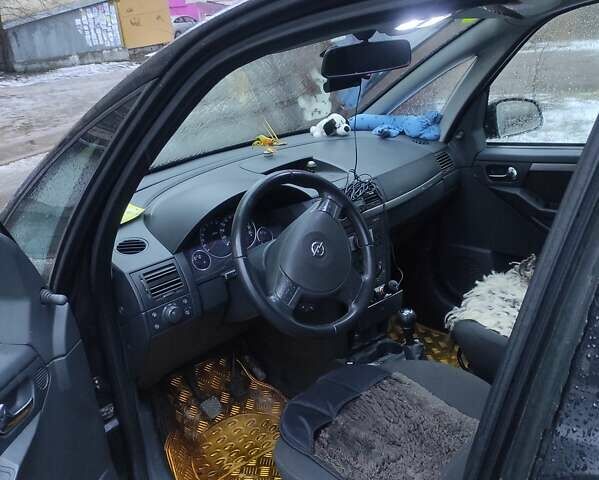 Черный Опель Мерива, объемом двигателя 1.4 л и пробегом 205 тыс. км за 5500 $, фото 4 на Automoto.ua