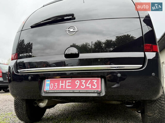 Черный Опель Мерива, объемом двигателя 1.6 л и пробегом 208 тыс. км за 4999 $, фото 47 на Automoto.ua