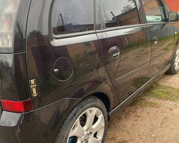 Чорний Опель Меріва, об'ємом двигуна 1.6 л та пробігом 261 тис. км за 5700 $, фото 3 на Automoto.ua