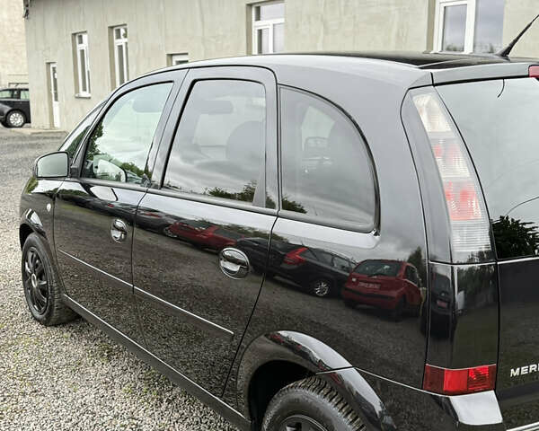 Черный Опель Мерива, объемом двигателя 1.6 л и пробегом 208 тыс. км за 4999 $, фото 44 на Automoto.ua