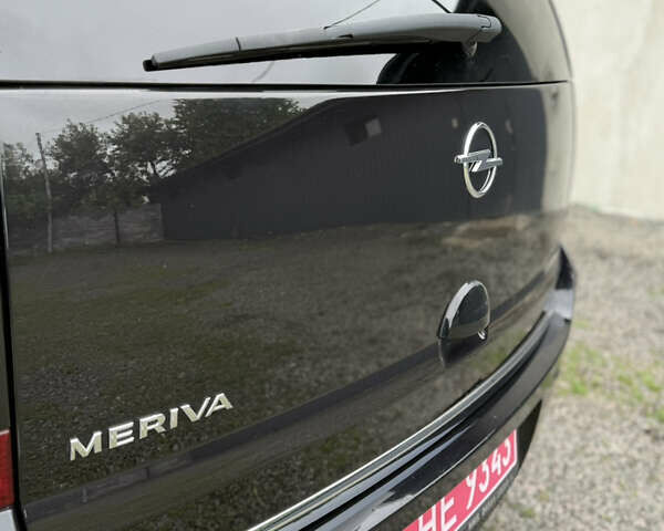 Черный Опель Мерива, объемом двигателя 1.6 л и пробегом 208 тыс. км за 4999 $, фото 71 на Automoto.ua