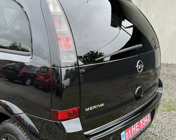 Черный Опель Мерива, объемом двигателя 1.6 л и пробегом 208 тыс. км за 4999 $, фото 45 на Automoto.ua