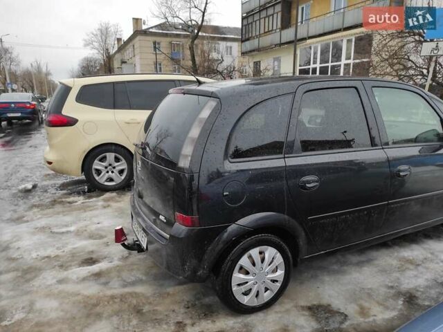 Черный Опель Мерива, объемом двигателя 1.4 л и пробегом 205 тыс. км за 5500 $, фото 1 на Automoto.ua
